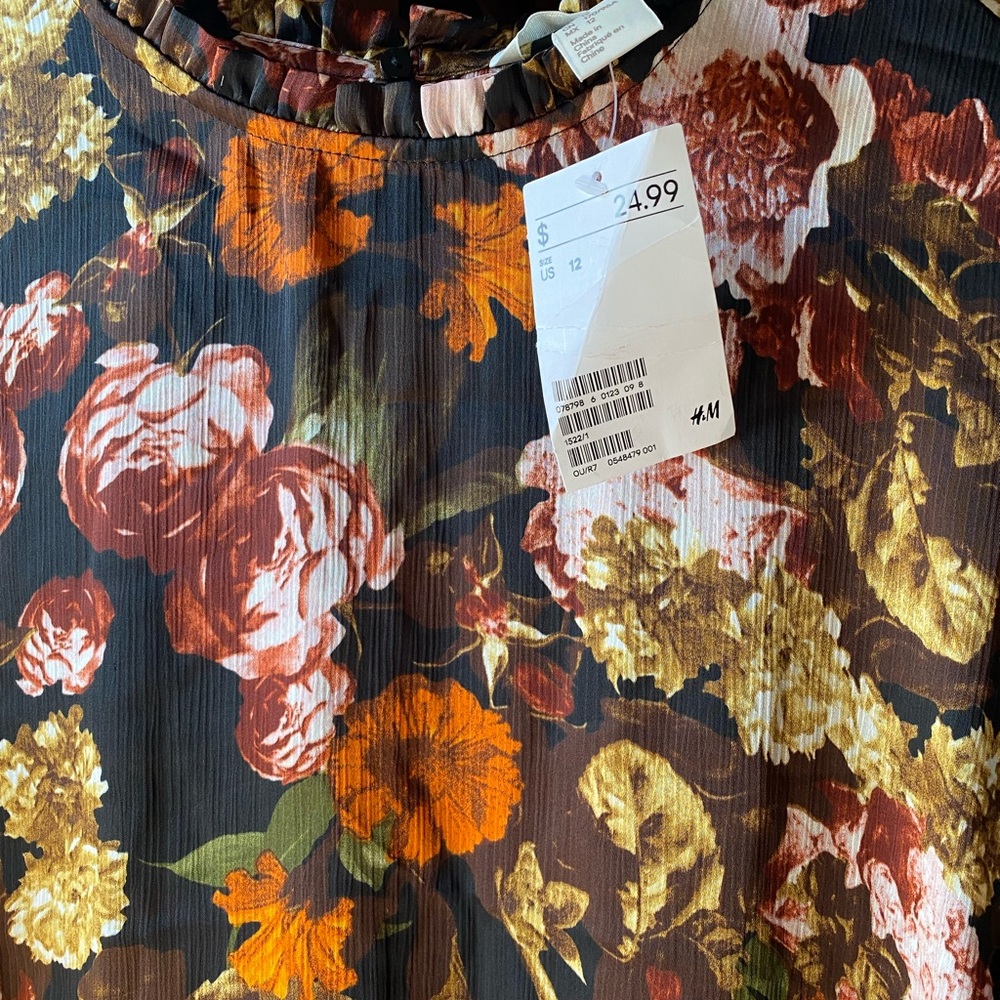 Beautiful peplum blouse from H&M - size 12